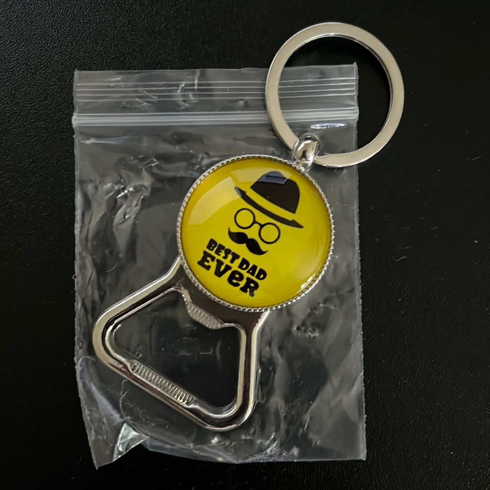 NIP “Best Dad Ever” bottle and can opener key chain.